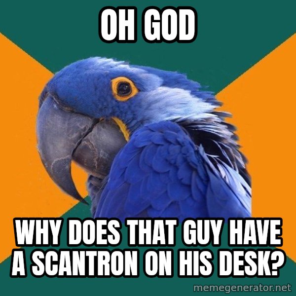 Paranoid Parrot meme: oh god / why does that guy have a scantron on his desk?
