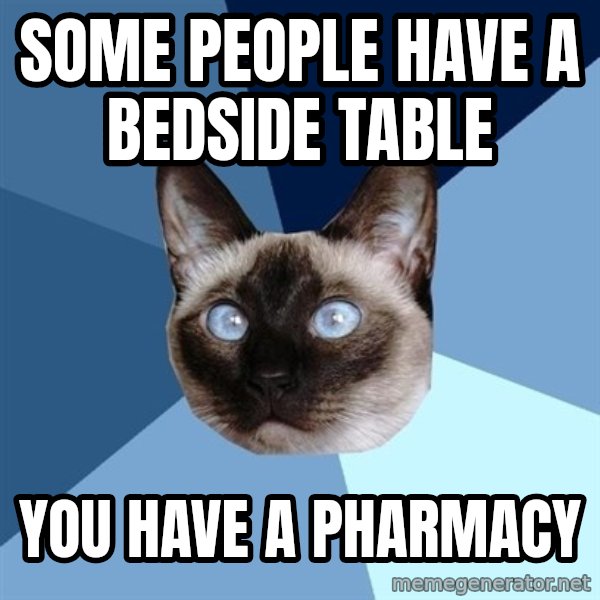 Chronic Illness Cat meme: Some people have a bedside table / you have a pharmacy