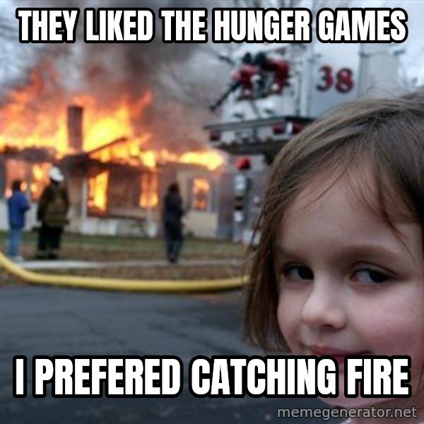 Disaster Girl meme: They liked the hunger games / i prefered catching fire