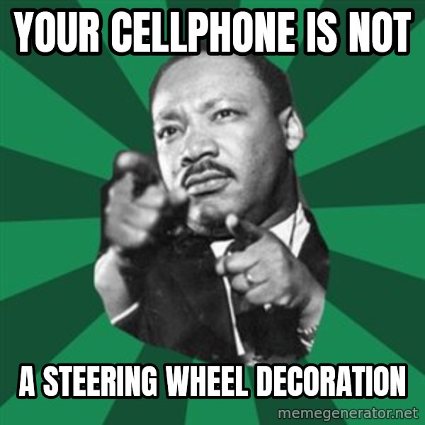 Martin Luther King jr.  meme: your cellphone is not / a steering wheel decoration
