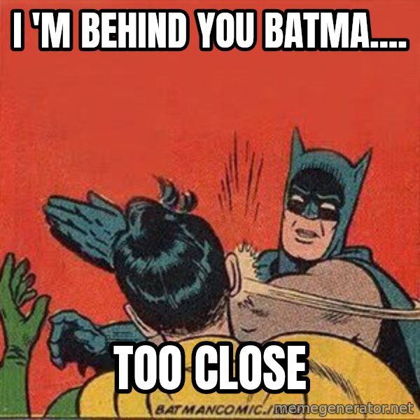 batman slap robin meme: I 'm behind you batma.... / too close